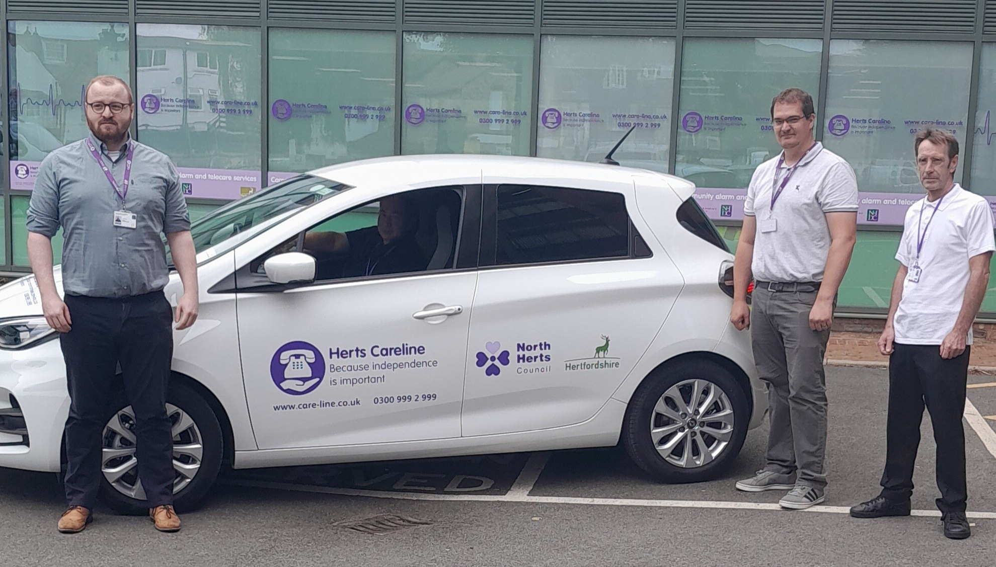 Herts Careline staff with their electric van