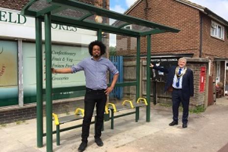 Councillors at the newly installed bus shelter in Royston