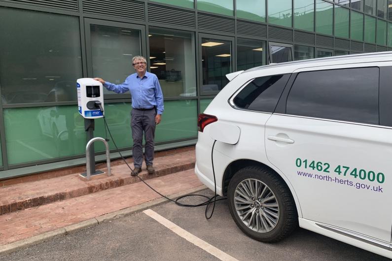 Cllr Jarvis with the new EV charging point
